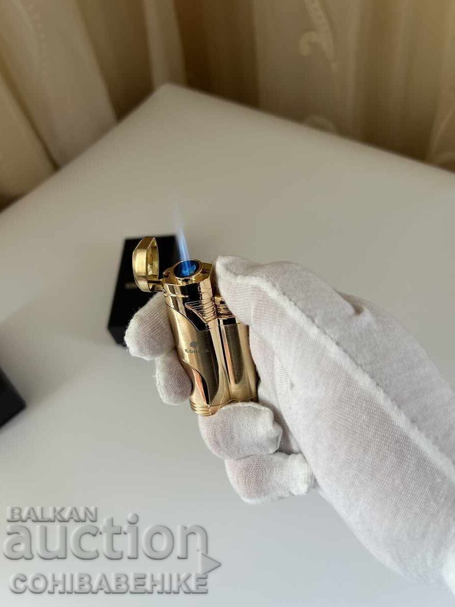 Brichetă pentru trabucuri Cohiba cu flacără dublă și punch cu preț € 25.00 | 48.90 BGN Brichetă pentru trabucuri Cohiba cu flacără dublă și punch cu preț € 25.00 | 48.90 BGN