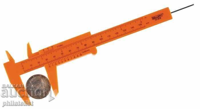 Πλαστική δαγκάνα LINDNER για ακριβή μέτρηση νομισμάτων