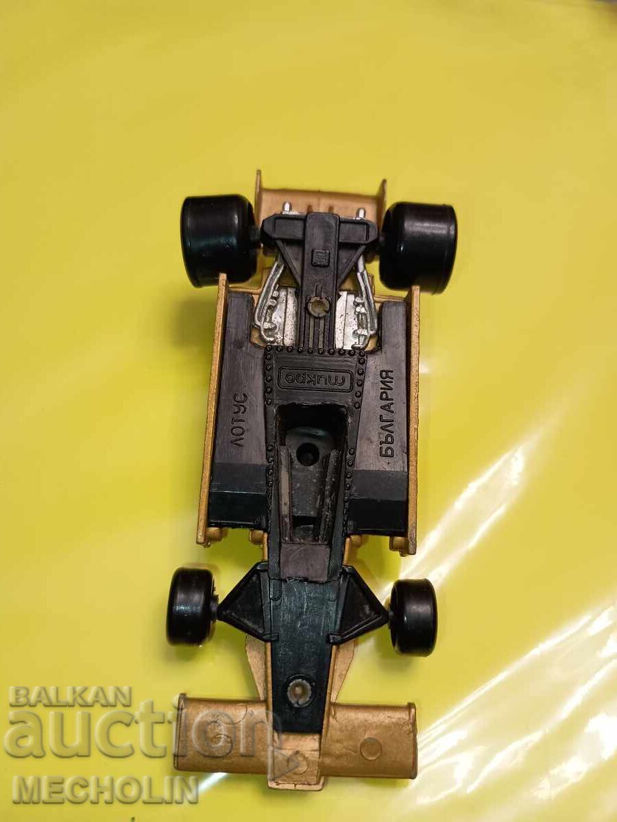 Livrarea Colecționabilă BULGARĂ MAȘINUȚĂ METALICĂ micro Lotus
