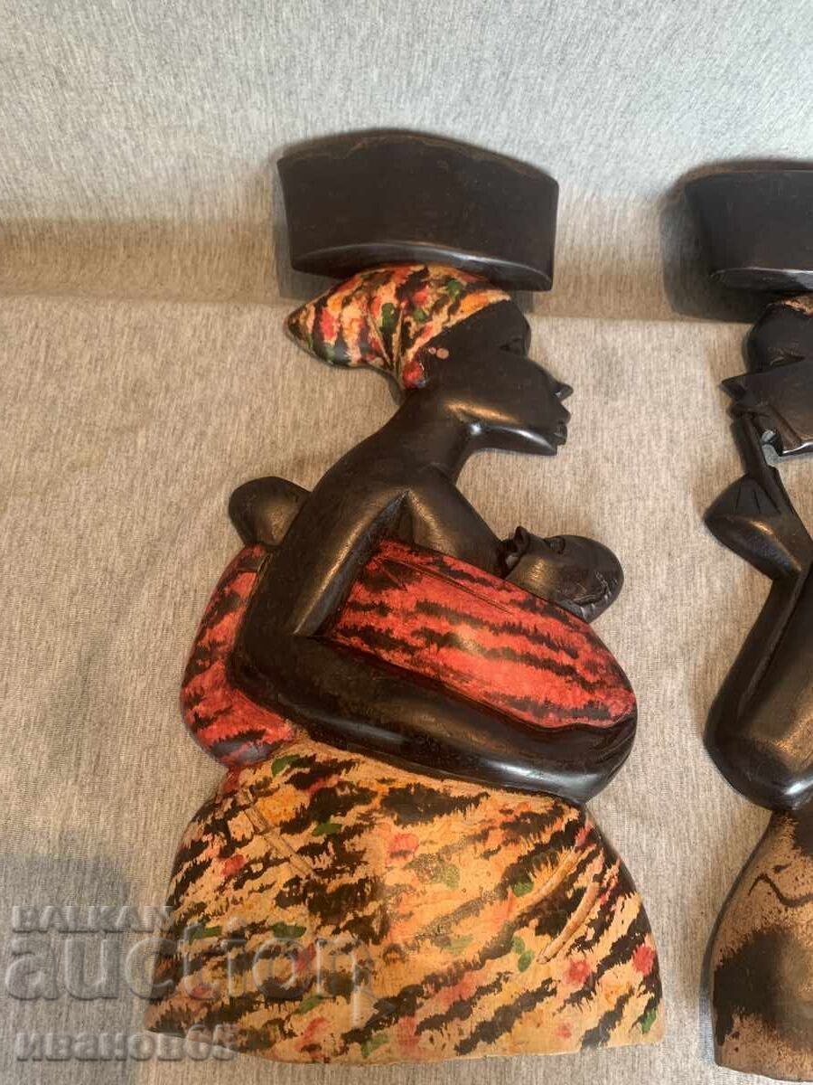 Auction  African wooden figures wall decorations