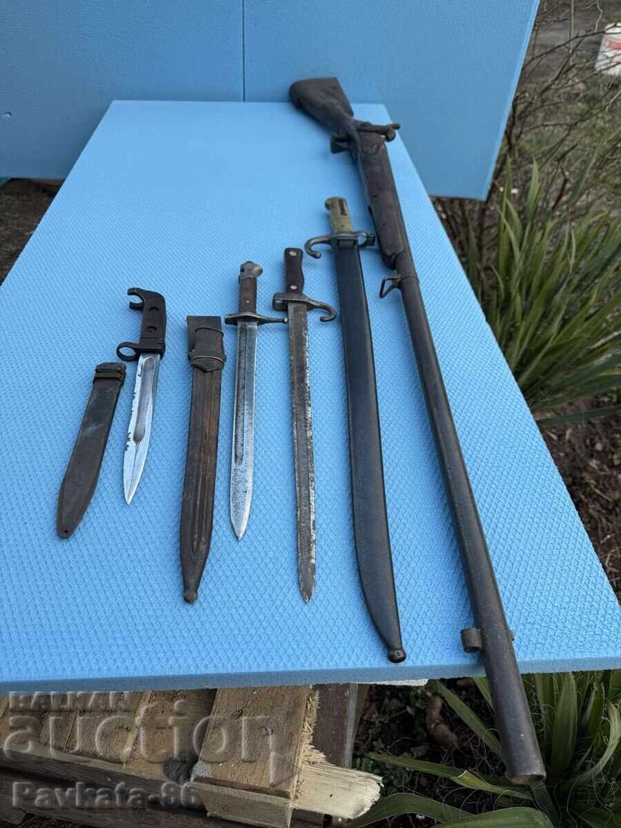 Lot de pumnale și pușcă cu preț € 900.00 | 1760.25 BGN Lot de pumnale și pușcă cu preț € 900.00 | 1760.25 BGN