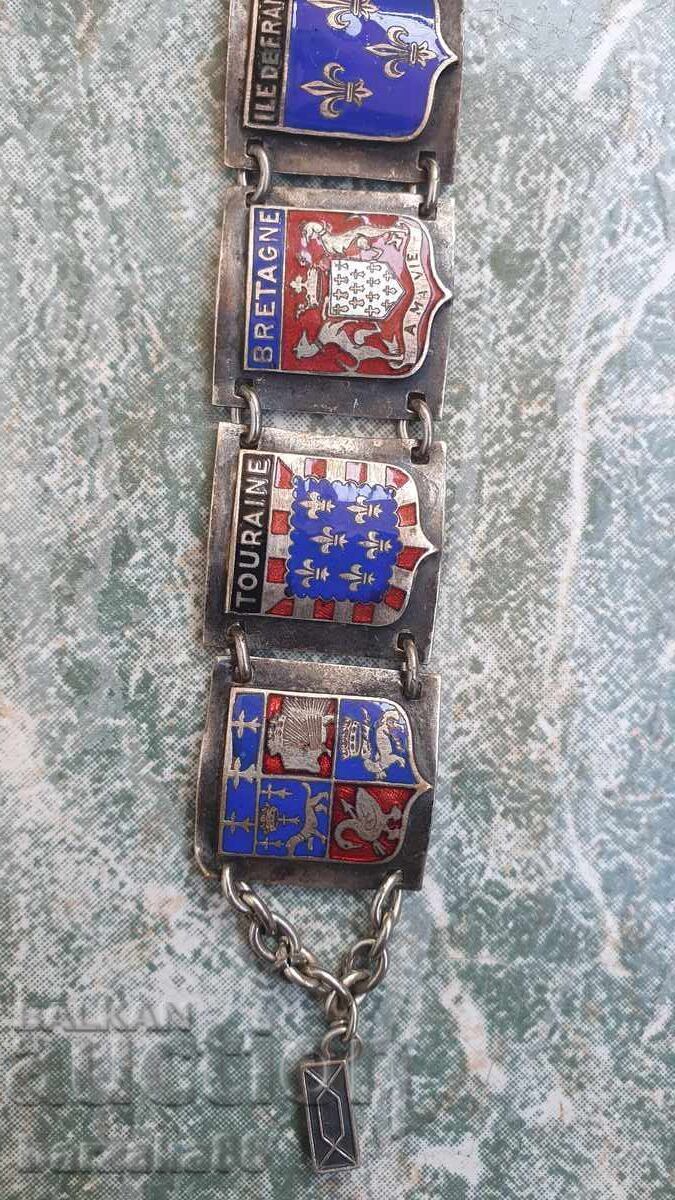 Auction  German silver-plated bracelet with crests