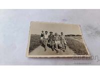 Photo of five young men on a trip