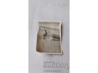 Φωτογραφία Άνθρωπος στην παραλία