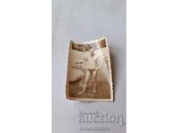 Снимка Млад мъж по бански в реката