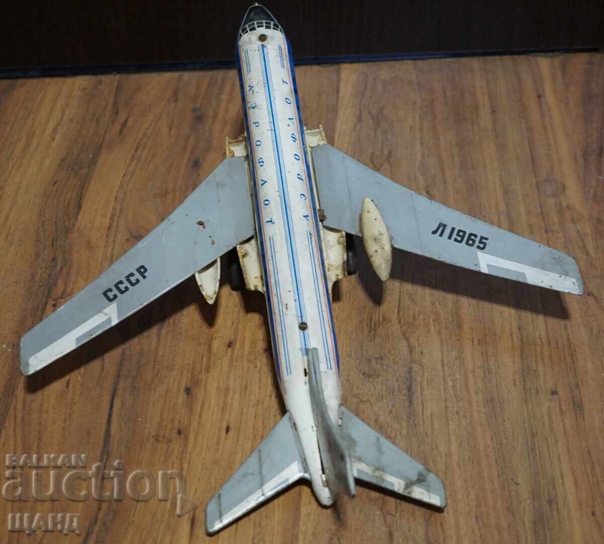 Delivery of Old Russian metal toy model airplane