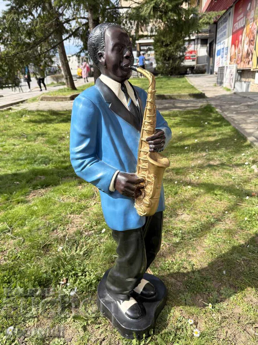 Licitație Figurină decorativă de muzician de jazz. Nr. 7953
