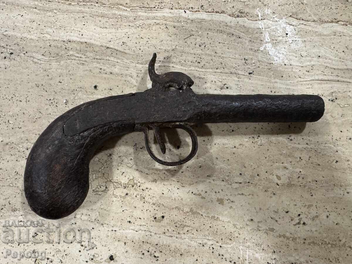 Vechi pistol capsulă