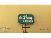 Advertising badge, de Dom Clothing, brand clothing