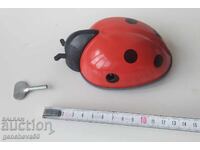 Vintage mechanical Russian toy KALINKA with key