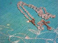 Necklace with a cross made of crystals