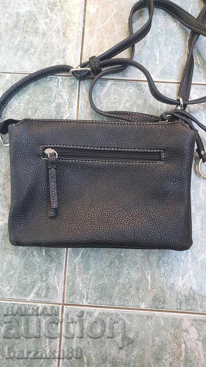 Delivery of Women's bag Suri Frey