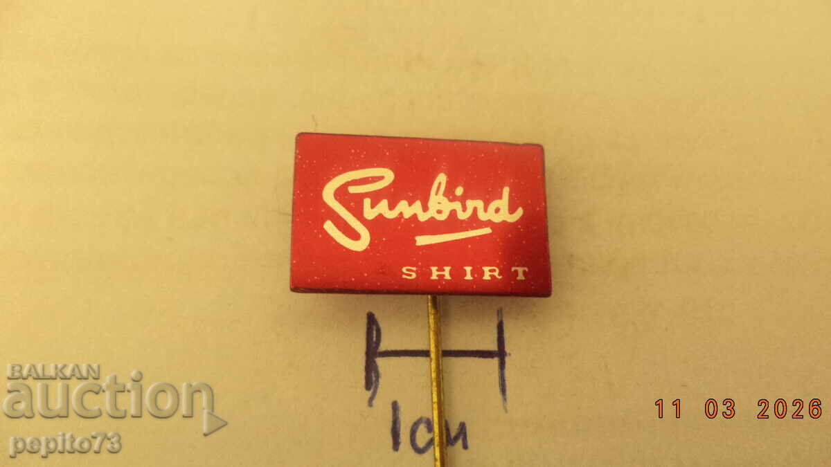 Insignă publicitară, Sunbird, marcă de cămăși pentru bărbați