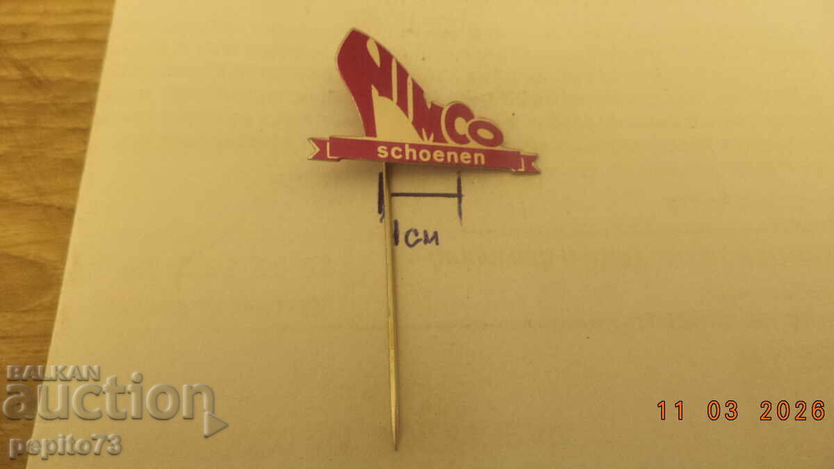 Licitație Insignă publicitară, NIMCO, marcă de încălțăminte