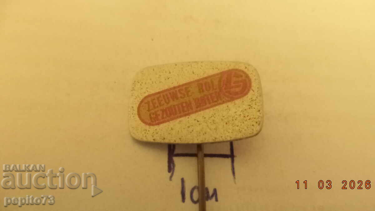 Licitație Insignă publicitară, Rol de Zeelanda, marcă de produse agricole