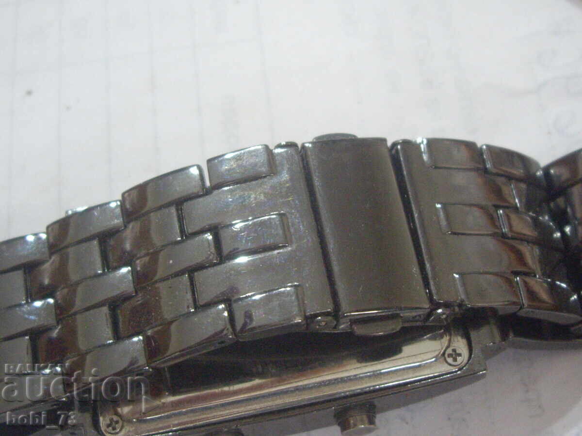 Livrarea Ceas bărbătesc straniu