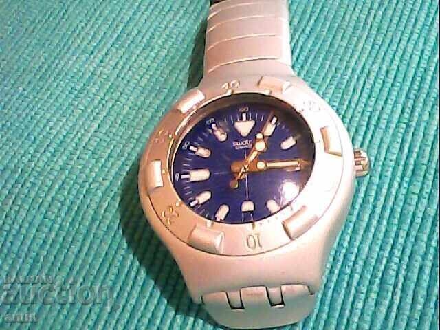 Frumos ceas Swatch, funcționează perfect, cu baterie nouă cu preț € 20.00 | 39.12 BGN Frumos ceas Swatch, funcționează perfect, cu baterie nouă cu preț € 20.00 | 39.12 BGN