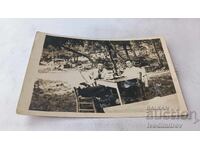 C-class Sofia Three men having a drink in the courtyard of Hotel Petersburg