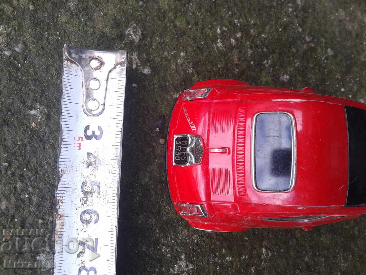 Auction  Small red FIAT 500 car