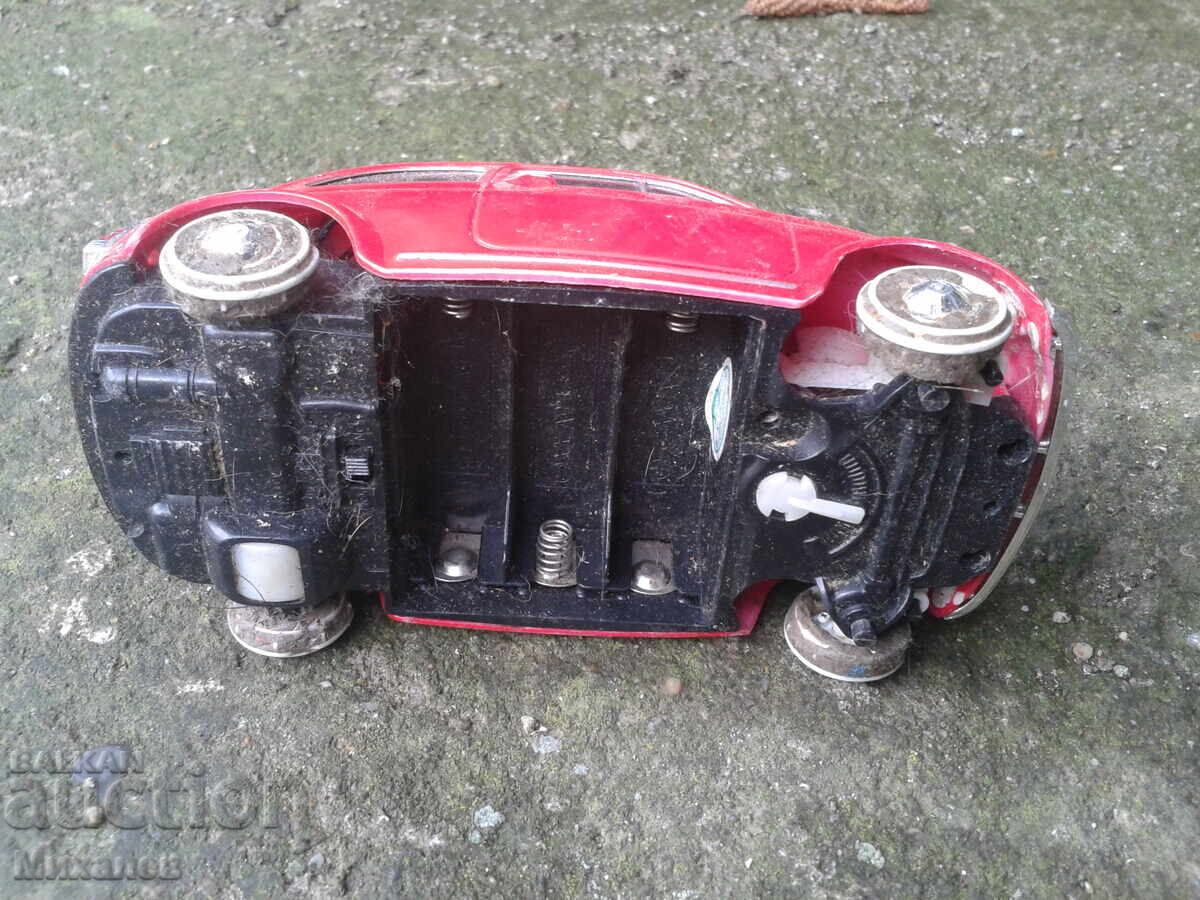 Delivery of Small red FIAT 500 car