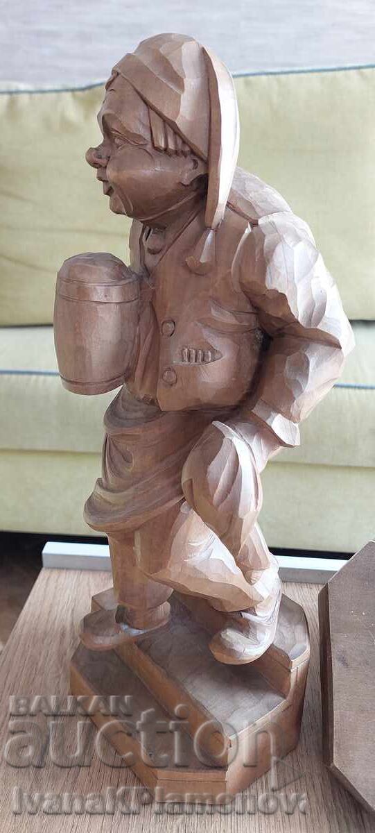 Livrarea Sculptură în lemn mare, masivă, cu suport de perete pentru cunoscători