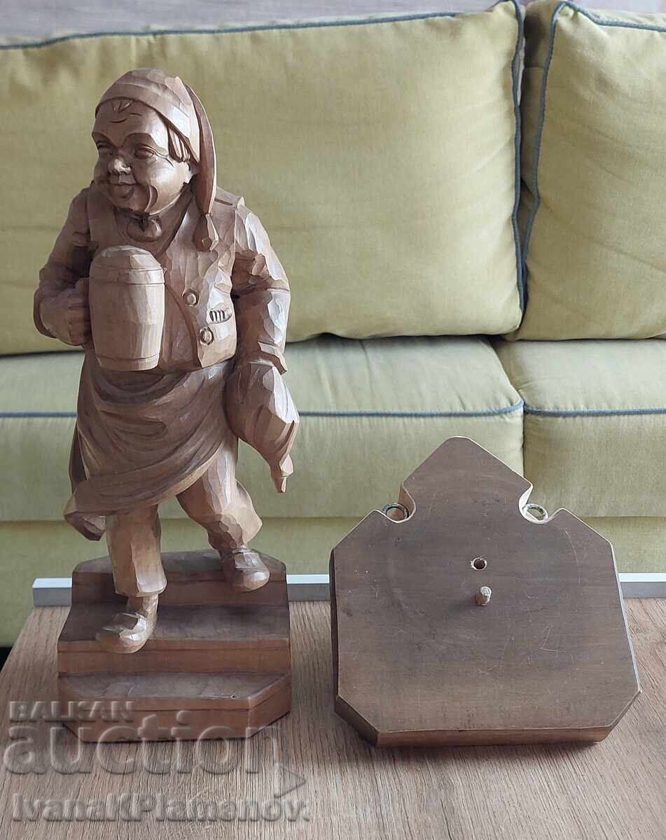 Sculptură în lemn mare, masivă, cu suport de perete pentru cunoscători