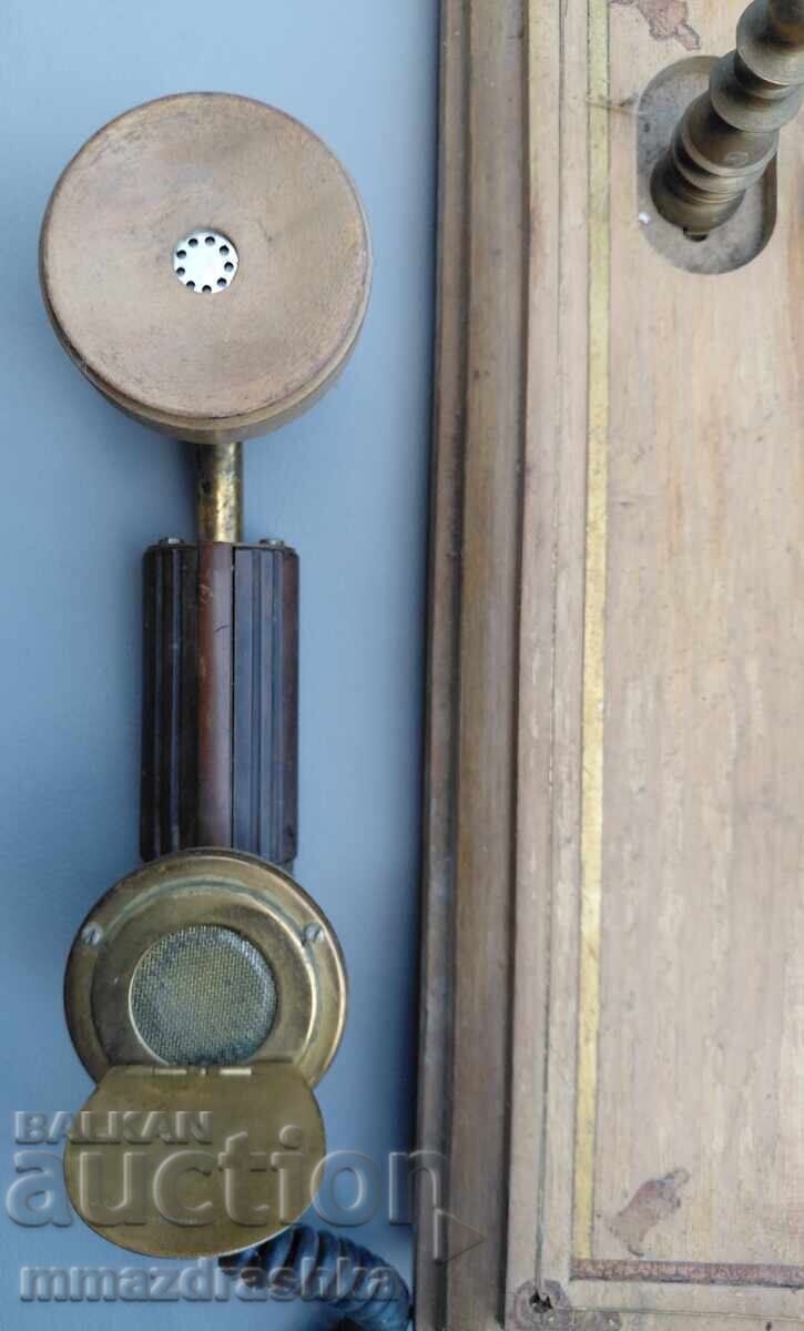 Delivery of 100-year-old wall phone