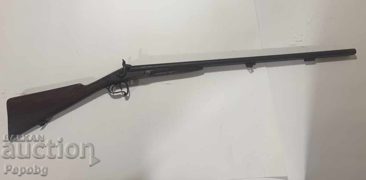 Veche pușcă capsulă