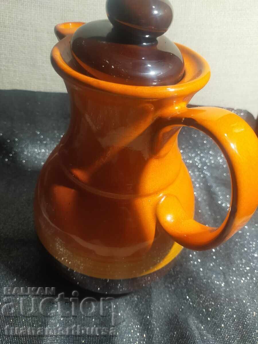 Livrarea Cană ceramică portocalie Livrarea Cană ceramică portocalie