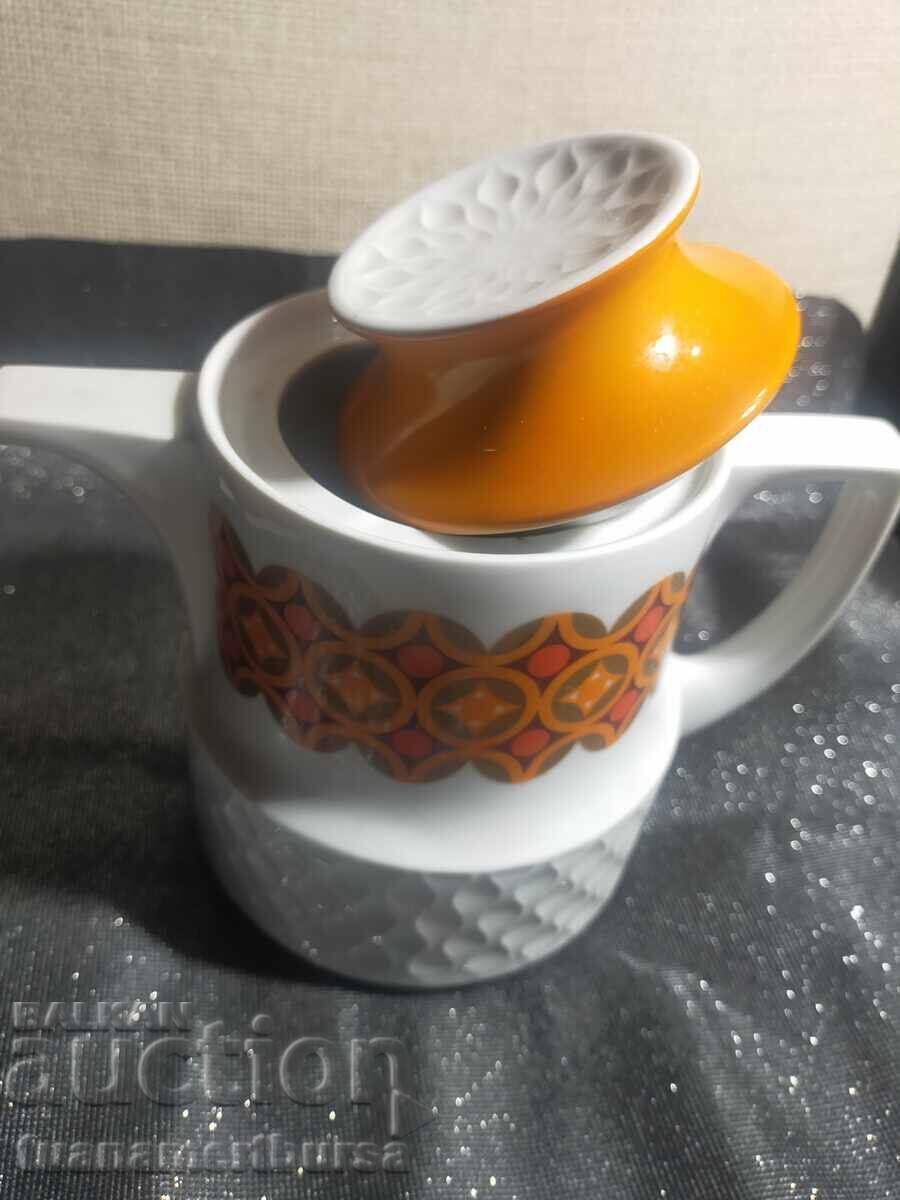 керамична кана с оранжеви и бели шарки с цена € 15.00 | 29.34 лв.