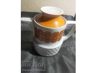 Cană ceramică cu modele portocalii și albe