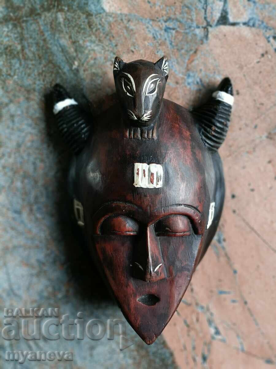 Auction  African mask, wood carving, handmade and colored