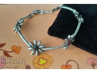 Old silver bracelet in the shape of flowers - hallmark