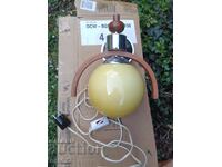 Retro table lamp with a spherical glass shade