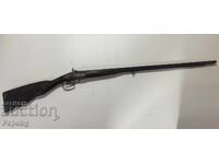 Double-barreled capsule rifle