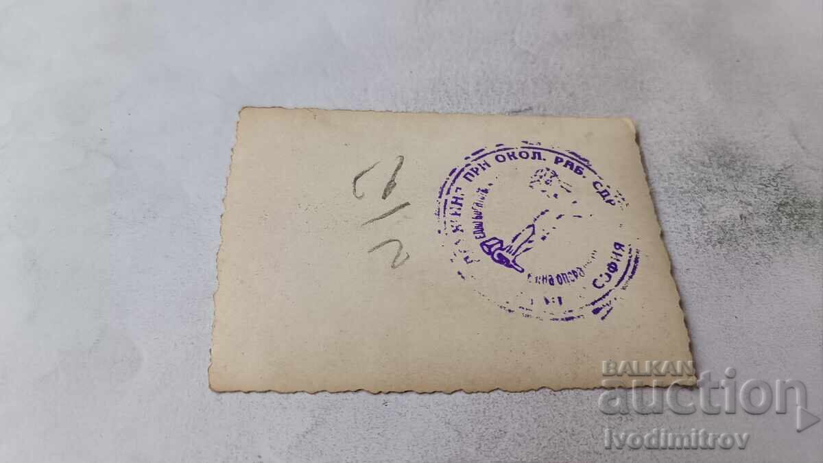 Photo Sofia Young men in front of a monument with price € 1.24 | 2.43 BGN