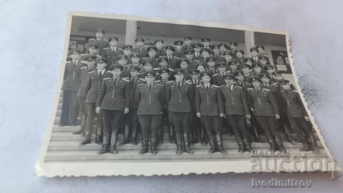 Αξιωματικοί φωτογραφιών στις σκάλες