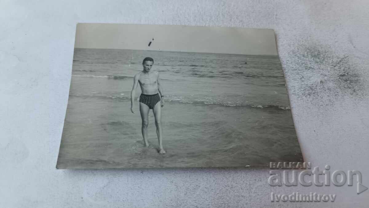 Φωτογραφία Άνθρωπος στην παραλία