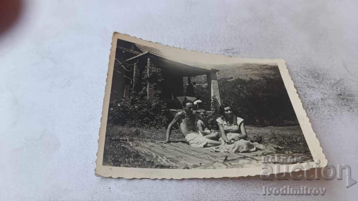 Photo Lukovo bus stop Man and young girl on the grass 1953