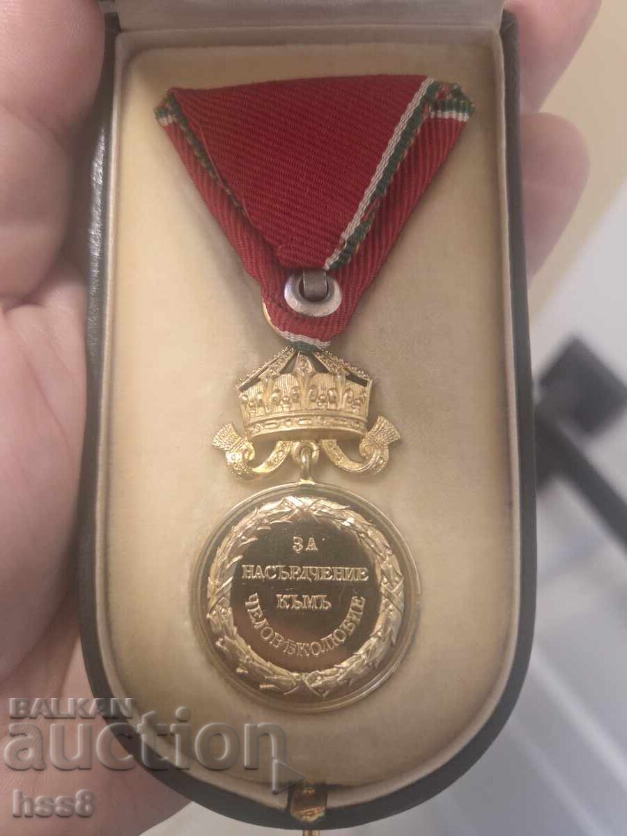 Livrarea Medalie de aur pentru Încurajarea Filantropiei Livrarea Medalie de aur pentru Încurajarea Filantropiei