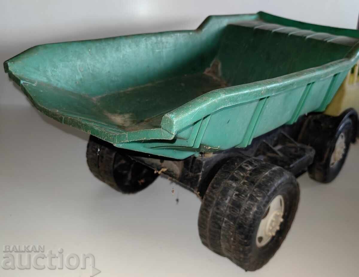 Delivery of SOCIALIST PLASTIC TOY TRUCK - DIRTY