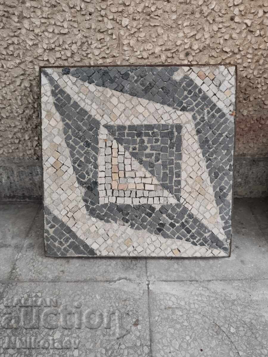 Decorative mosaic panel in a metal frame, natural material