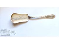 Spatula placata cu argint