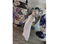 Porcelain figurine by the brand NAO by Lladro!
