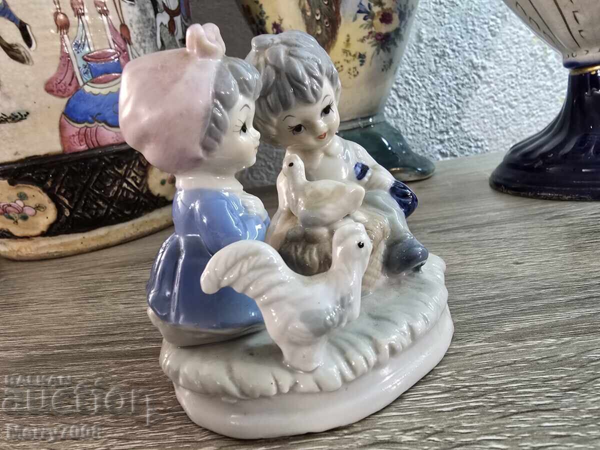 Collectible porcelain figurine depicting two small children with price € 0.01 | 0.02 BGN