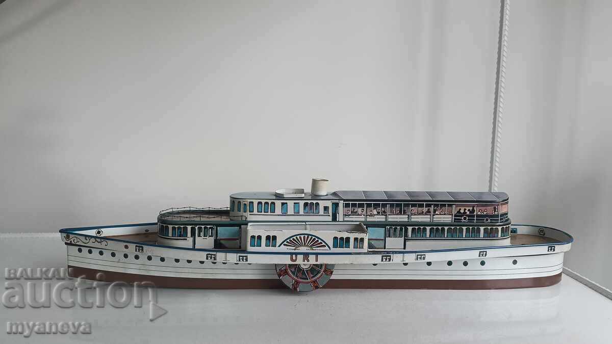 Jucărie vintage din tablă