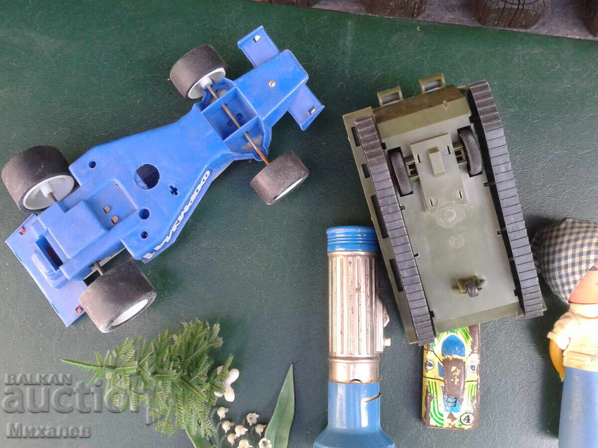 Delivery of toys candles artificial flowers