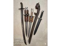 Collection of authentic edged weapons, bayonets, saber, etc