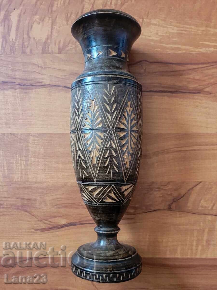 Auction  Hand-carved wooden vase