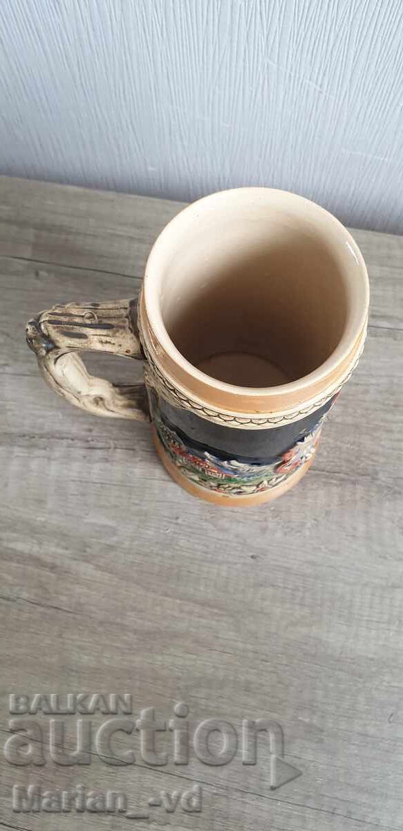Delivery of Old porcelain beer mug
